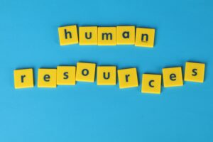 Tiles spelling 'human resources', representing HR process automation